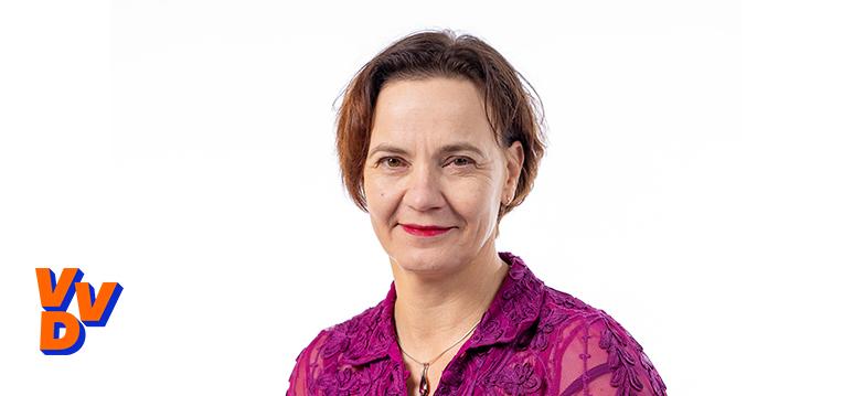 Portretfoto Judith Tielen met partijlogo VVD