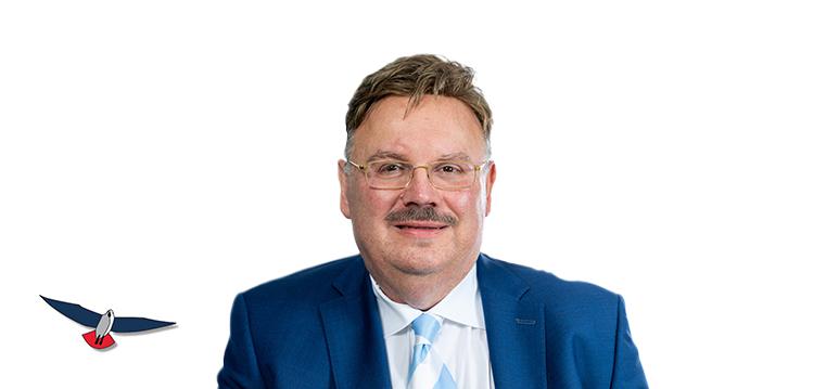 Portretfoto Robert Rep met partijlogo PVV